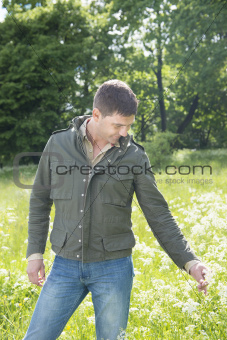 Man standing in a meadow