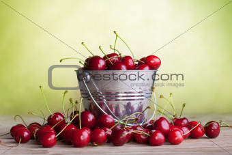 Lots of cherries on old table