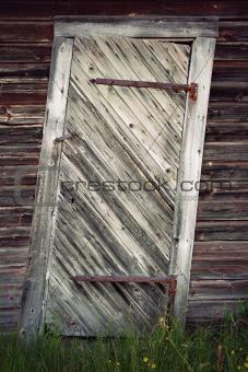 uneven old wooden door