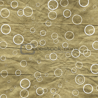 Old crumpled golden paper background with circles
