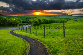  pathway leading into sunset