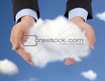 hand of businessman holding a single cloud