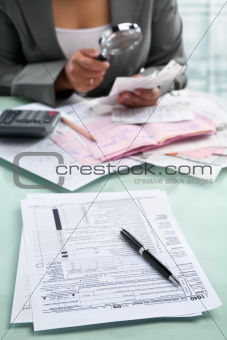 Tax form and businesswoman
