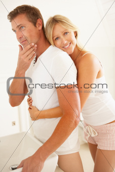Young Couple Getting Ready In Bathroom