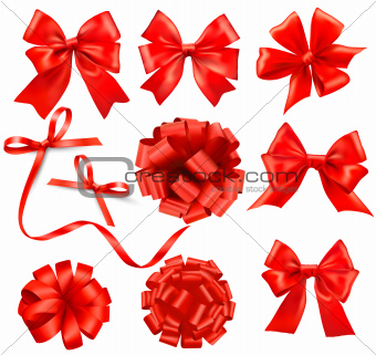 Big set of red gift bows with ribbons