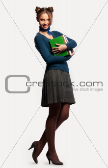girl with a bunch of books