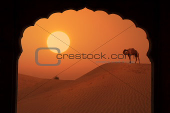 silhouette of arabic architecture on desert