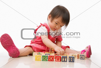 Asian female toddler playing