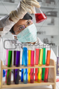 Scientist examining chemical solution