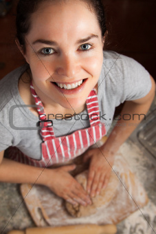 Happy woman baking at home