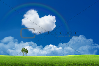 Blue sky with clouds and a rainbow