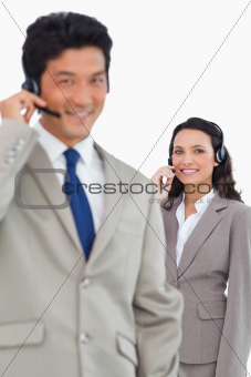 Smiling customer support employees