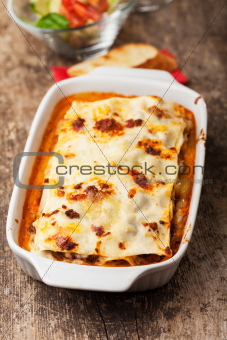 italian lasagna on a square plate 