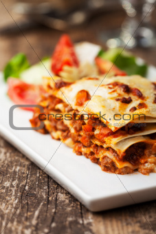 italian lasagna on a square plate 