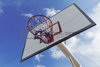 Basket ball hoop with blue sky