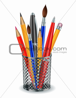 Brushes, pencils and pens in the holder