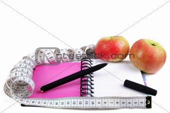 notepad and apple