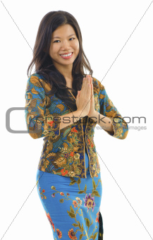 Asian woman gestures welcoming