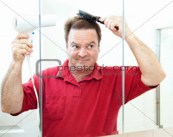 Mature Man Drying His Hair