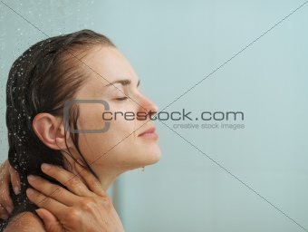 Portrait of woman taking shower