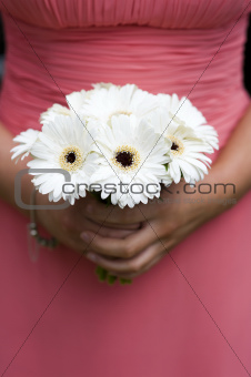 bridesmaid holding a bouquet of berbera