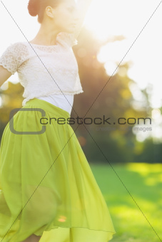 Young woman dancing on forest
