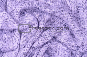 close up purple knitted pullover background