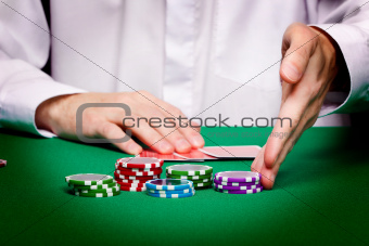 men's hands, playing cards and chips