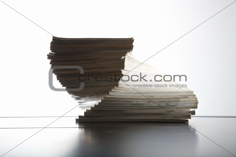 magazines piled on table