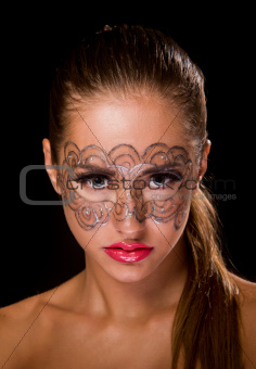 young woman with lace makeup