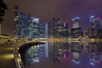 Singapore City Skyline Along Marina Bay Boardwalk at Night