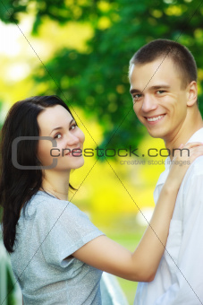 young couple in summer park
