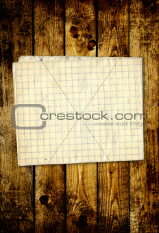 Sheet paper on wooden planks