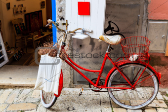 Old Red Bicycle at the Shop Door in Rovinj, Croatia