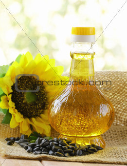 jar sunflower oil and sunflower seeds