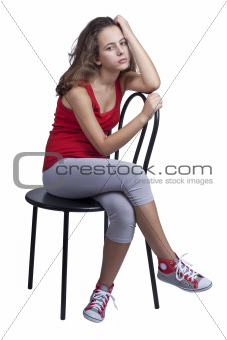 A girl sitting on a chair