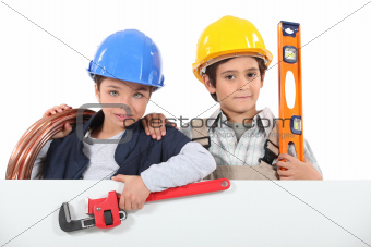 Kids dressed up as builders