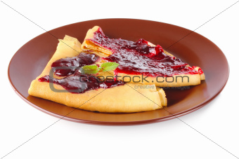 bitten pancake with sweet jam