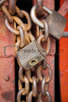 old rusty metal padlocks on chains