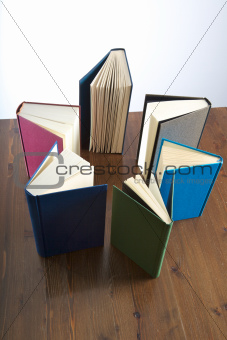 star of books on table 