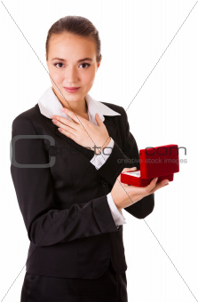 Admired business woman with open jewel box