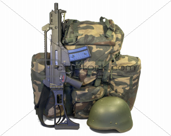 Soldier equipment: automatic rifle, backpack, helmet. Isolated.