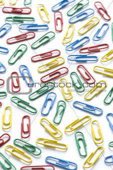 colorful paperclips on white