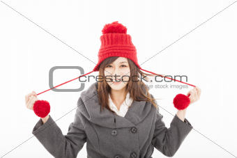  happy young woman wearing winter coat and cap