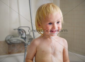 Portrait of baby in bath foam