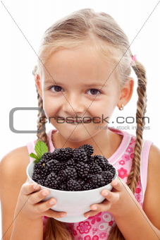 Yummy blackberries - happy healthy girl with fresh fruits