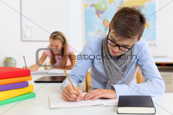 Teenage students in class