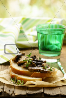 Sandwich crostini  with fried mushrooms and thyme
