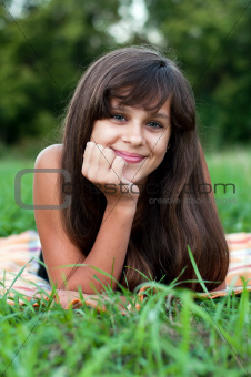 Brunette teen girl on nature