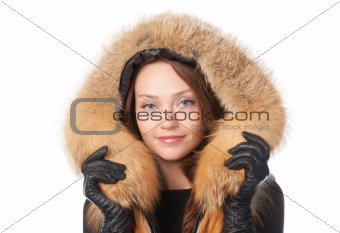 Beautiful woman in fur trimmed jacket